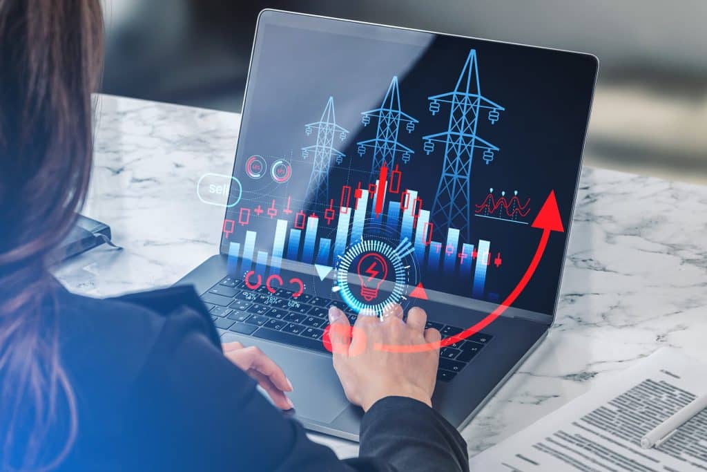 businessman analysing commercial electricity rates australia